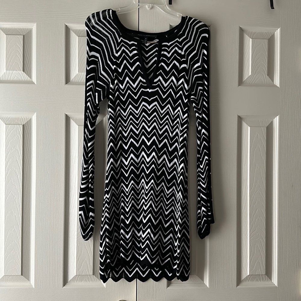 White House Black Market chevron dress, button sleeve detail shown